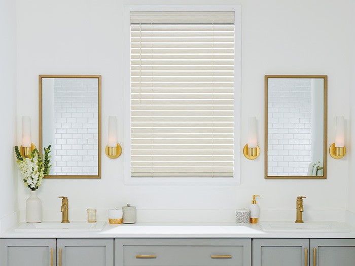 Bathroom vanity with a window featuring EverWood Alternative Wood Blinds in TruGrain  Color: Silver Lining
